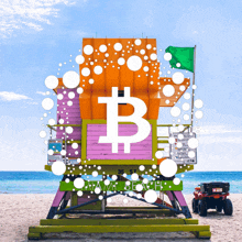 a lifeguard tower on a beach with a bitcoin symbol in front of it