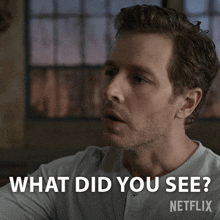 a man in a white shirt says what did you see on a netflix ad