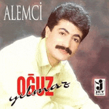 a man with a mustache is on the cover of a cd called alemci