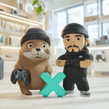 a seal holding an xbox controller and a man standing next to a green x