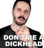 a man with a beard and mustache says " don 't be a dickhead " with his finger