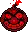 a pixel art illustration of a red pumpkin with a red ribbon coming out of it 's mouth .