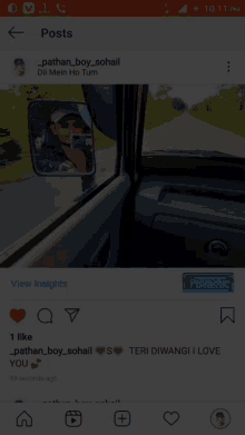 a phone screen shows a picture of a man taking a picture of himself in a car