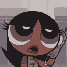 a girl from the powerpuff girls talking on a phone