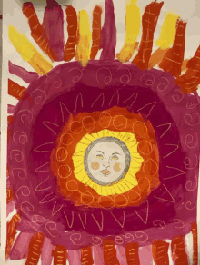 a drawing of a sun with a face in the middle