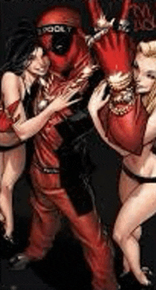 a man in a deadpool costume is surrounded by two women