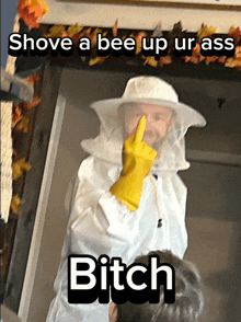 a man in a bee suit giving the middle finger with the words shove a bee up ur ass bitch below him