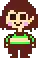 a pixel art of a girl with brown hair and a green shirt is standing on a white background .