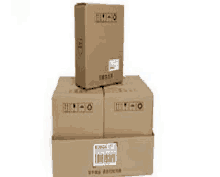 a group of cardboard boxes stacked on top of each other on a white background .