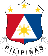 a red , white , and blue shield with the flag of the philippines on it .