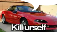 a red car with kill yourself written on the side