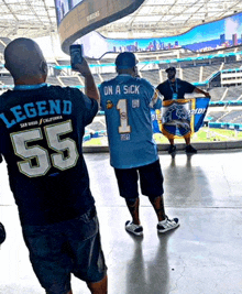 a man wearing a shirt that says legend on it