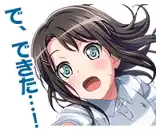 a sticker of a girl with a surprised look on her face and a foreign language .