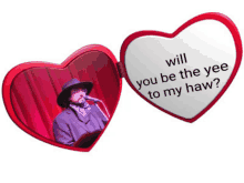 a heart shaped mirror with a picture of a man and the words " will you be the yee to my haw " on it