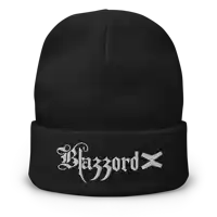 a black beanie with the word blazzard x on it