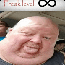 a man making a funny face with the words freak level written on the top