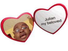 a heart shaped mirror that says julian my beloved on it