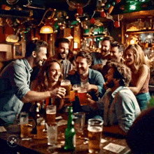 a group of people toasting with beer glasses in a bar with a logo that says ' wanderlust ' on it