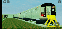 a screenshot of a train that says ' subway ' on the front