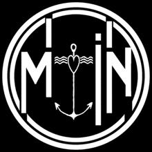 a white logo with the letters m and n and an anchor