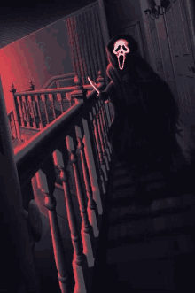 scream is standing on the stairs holding a knife in his hand .