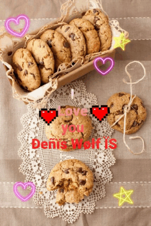 a basket of chocolate chip cookies with the words " i love you denis wolf is " on the bottom