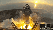 an advertisement for mad viking games shows a rocket launching into space