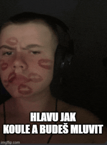 a man with kisses on his face and the words hlavu jak koule a budeš mluvit