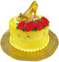 a yellow cake with a shoe on top of it