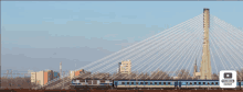 a train is going under a bridge with a thumbnail maker logo in the foreground