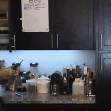 a kitchen with a white board that says mvps