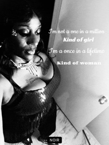 a black and white photo of a woman with a quote that says noir