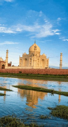 a view of the taj mahal from across the water