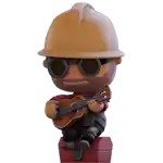 a figurine of a man wearing a hard hat and goggles is playing a guitar .