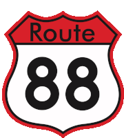 a red and white route 88 sign with black numbers on it