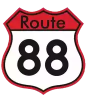 a red and white route 88 sign with black numbers on it