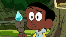 a cartoon character is holding a diamond in his hands