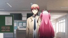 a man in a suit and tie stands next to a pink haired girl