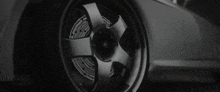 a close up of a car wheel with a brake on it .