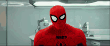 a close up of a spider man 's face with the words what written on his chest