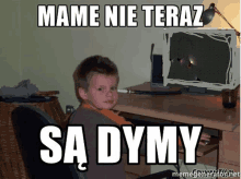 a young boy sits in front of a computer screen with a meme that says mame nie teraz sa rymy