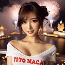 a woman wearing a toto macau t-shirt with fireworks in the background