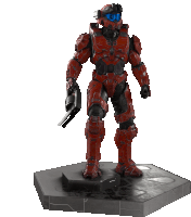 a statue of a red spartan holding a rifle