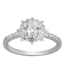 a white gold ring with a large diamond in the middle