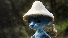 a blue cat wearing a mushroom hat and carrying a snail