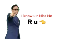 a man in a suit and tie pointing at the camera with the words " i know u r miss me ru "