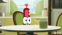 a cartoon character sits at a table next to a jar of pickles and a netflix logo