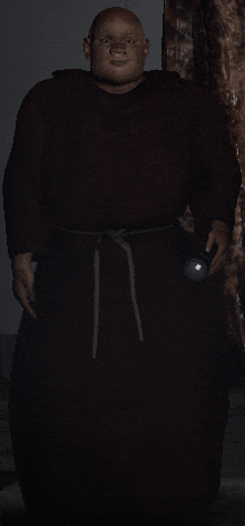 a man in a brown robe holds a flashlight