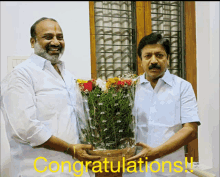 two men are holding a bouquet of flowers with the words congratulations written on the bottom