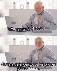 a man sitting at a desk with a laptop that says led on the front